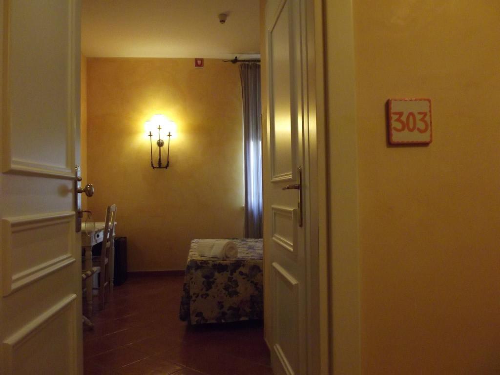 Acos Marsala City Hotel Bilik gambar